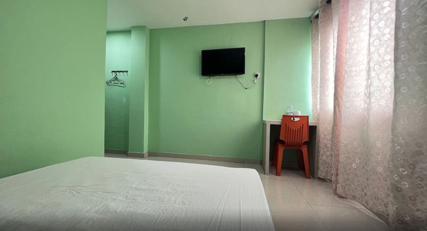 Imagen de la habitación del Hotel OYO 90789 Stutong Point. Foto 16