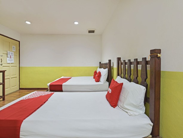 Imagen de la habitación del Hotel OYO 90792 Hezza Inn. Foto 2