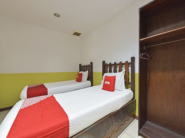Imagen de la habitación del Hotel OYO 90792 Hezza Inn. Foto 3