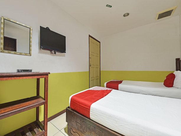Imagen de la habitación del Hotel OYO 90792 Hezza Inn. Foto 5
