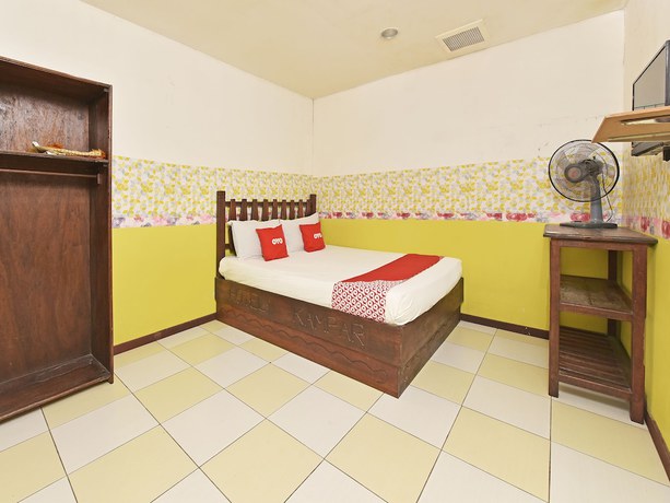 Imagen de la habitación del Hotel OYO 90792 Hezza Inn. Foto 8
