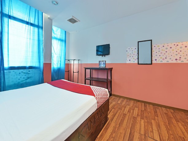 Imagen de la habitación del Hotel OYO 90792 Hezza Inn. Foto 10