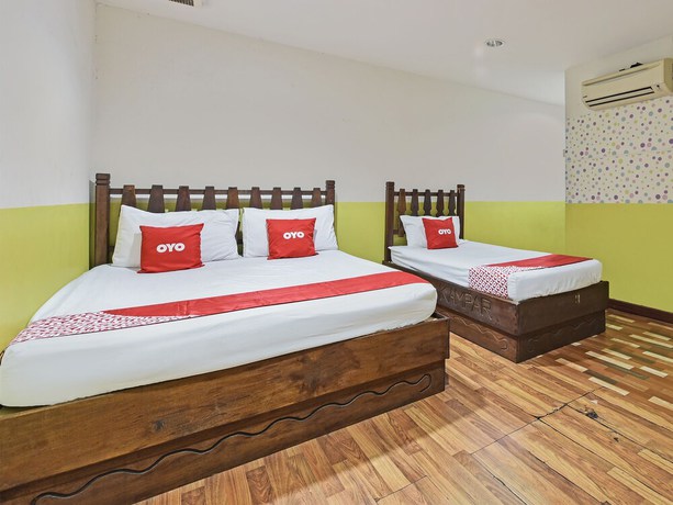 Imagen de la habitación del Hotel OYO 90792 Hezza Inn. Foto 11