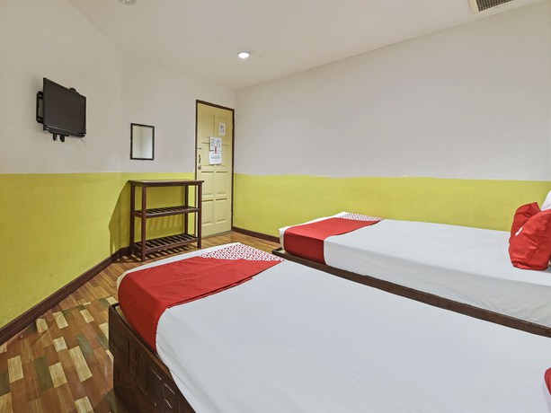 Imagen de la habitación del Hotel OYO 90792 Hezza Inn. Foto 14