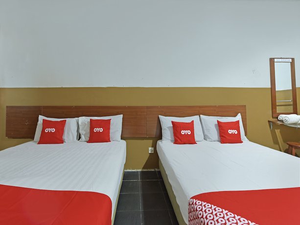 Imagen de la habitación del Hotel OYO 90794 Maple. Foto 2