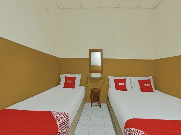 Imagen de la habitación del Hotel OYO 90794 Maple. Foto 3