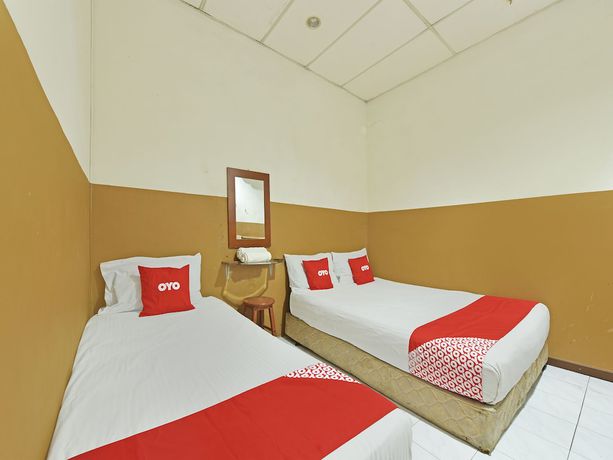 Imagen de la habitación del Hotel OYO 90794 Maple. Foto 4