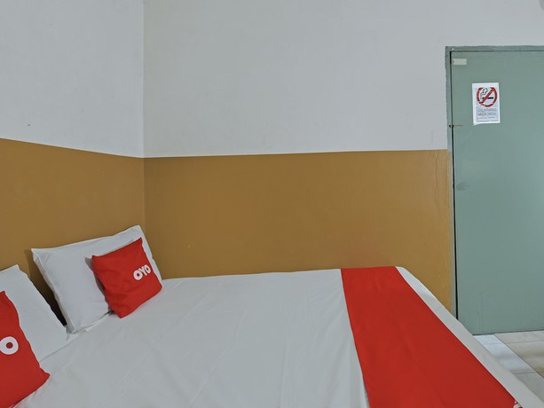 Imagen de la habitación del Hotel OYO 90794 Maple. Foto 5