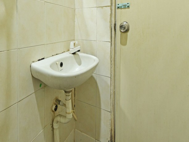 Imagen de la habitación del Hotel OYO 90794 Maple. Foto 6