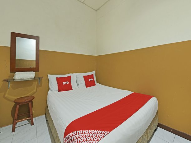 Imagen de la habitación del Hotel OYO 90794 Maple. Foto 9
