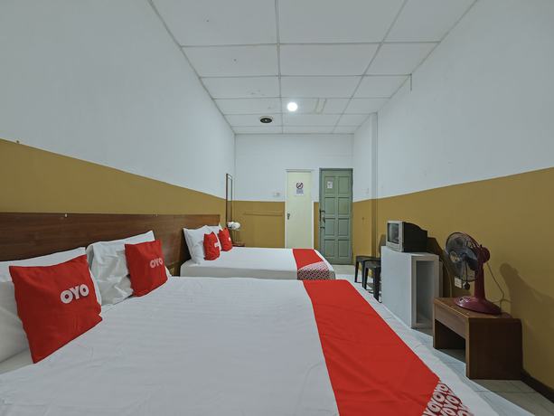 Imagen de la habitación del Hotel OYO 90794 Maple. Foto 15
