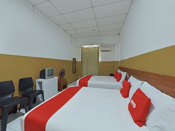Imagen de la habitación del Hotel OYO 90794 Maple. Foto 16
