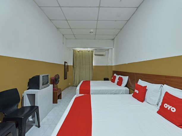 Imagen de la habitación del Hotel OYO 90794 Maple. Foto 17