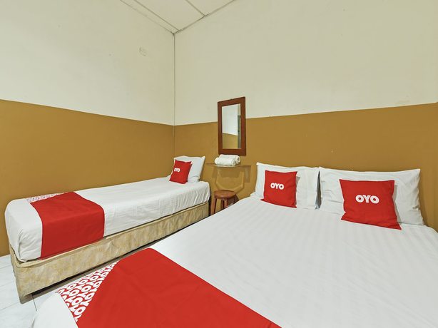 Imagen de la habitación del Hotel OYO 90794 Maple. Foto 18