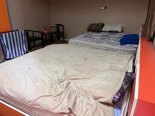 Imagen de la habitación del Hotel OYO 90797 Napoh Motel. Foto 6