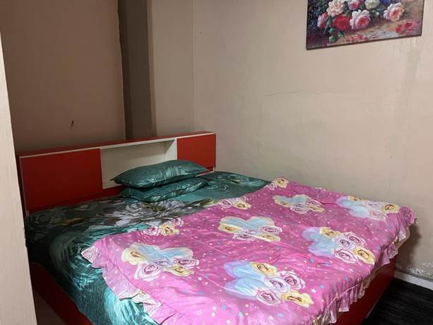 Imagen de la habitación del Hotel OYO 90797 Napoh Motel. Foto 8