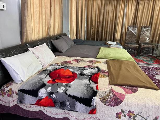 Imagen de la habitación del Hotel OYO 90797 Napoh Motel. Foto 13
