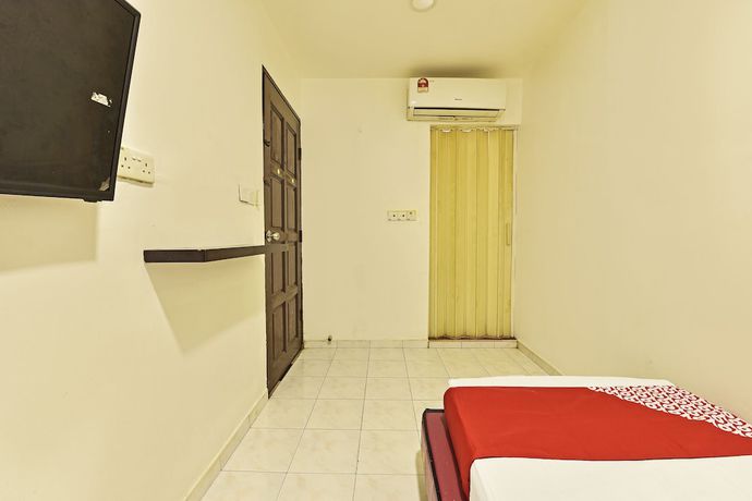 Imagen de la habitación del Hotel OYO 90806 Rumah Tumpangan Laut Selatan. Foto 2