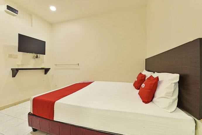 Imagen de la habitación del Hotel OYO 90806 Rumah Tumpangan Laut Selatan. Foto 3
