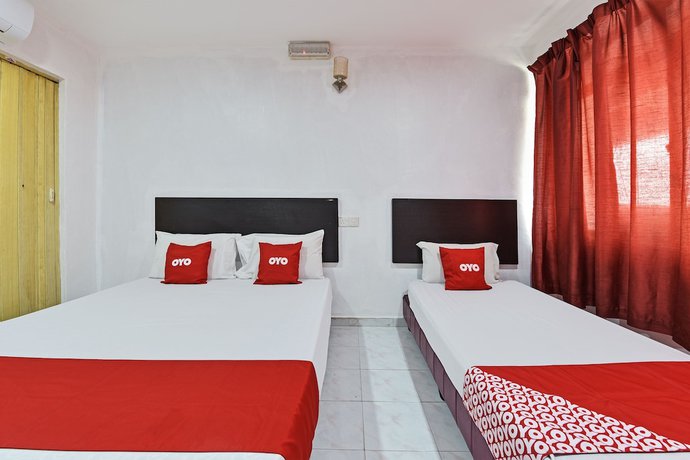 Imagen de la habitación del Hotel OYO 90806 Rumah Tumpangan Laut Selatan. Foto 6