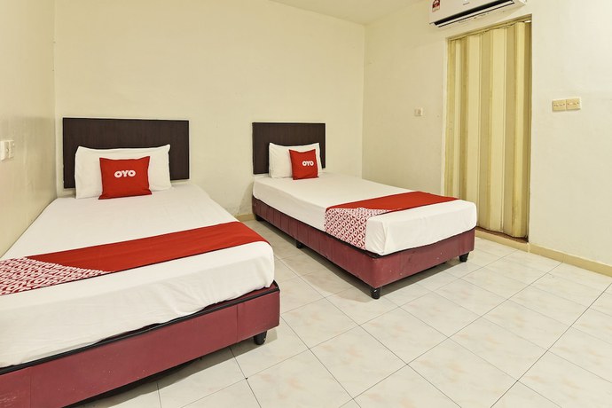 Imagen de la habitación del Hotel OYO 90806 Rumah Tumpangan Laut Selatan. Foto 8