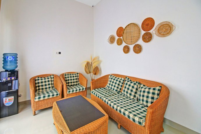 Imagen de los interiores del Hotel OYO 90820 Madania Guesthouse Syariah. Foto 11