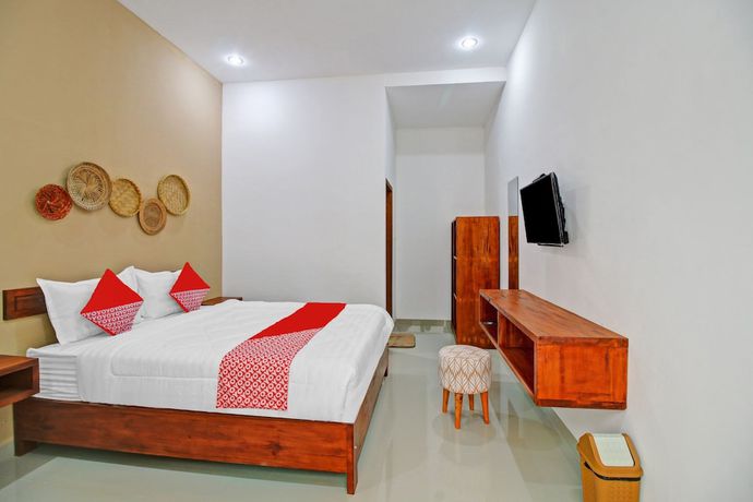 Imagen de la habitación del Hotel OYO 90820 Madania Guesthouse Syariah. Foto 2