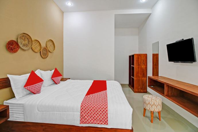Imagen de la habitación del Hotel OYO 90820 Madania Guesthouse Syariah. Foto 3