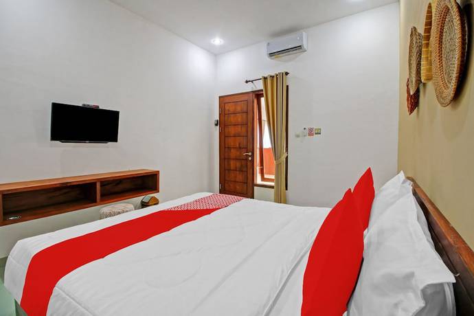 Imagen de la habitación del Hotel OYO 90820 Madania Guesthouse Syariah. Foto 4