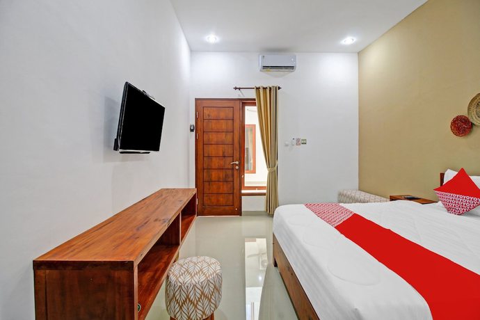 Imagen de la habitación del Hotel OYO 90820 Madania Guesthouse Syariah. Foto 6