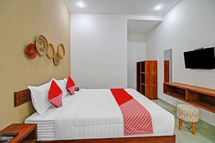 Imagen de la habitación del Hotel OYO 90820 Madania Guesthouse Syariah. Foto 7