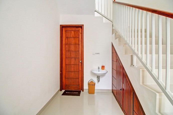 Imagen de los interiores del Hotel OYO 90820 Madania Guesthouse Syariah. Foto 15