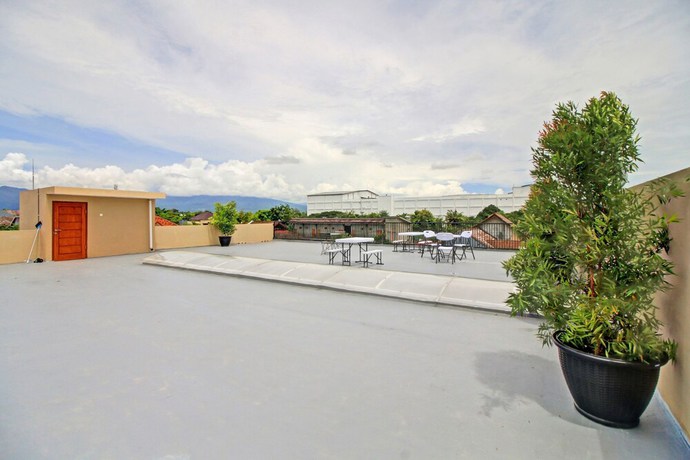 Imagen de los interiores del Hotel OYO 90820 Madania Guesthouse Syariah. Foto 16