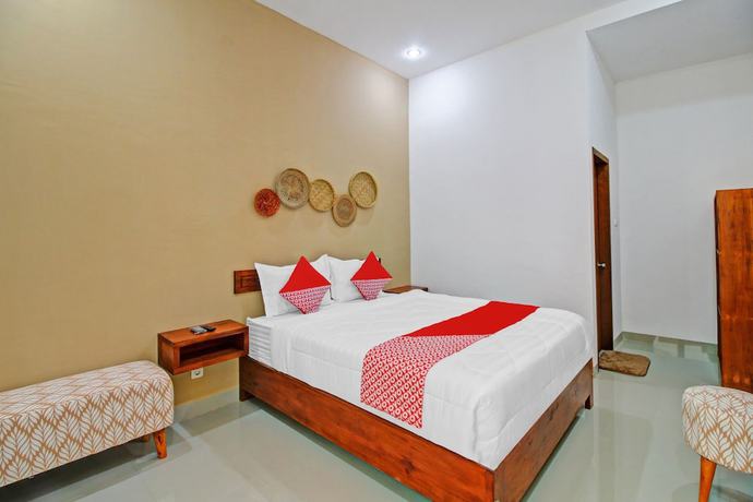 Imagen de la habitación del Hotel OYO 90820 Madania Guesthouse Syariah. Foto 8
