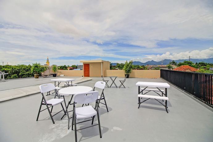 Imagen de los interiores del Hotel OYO 90820 Madania Guesthouse Syariah. Foto 19