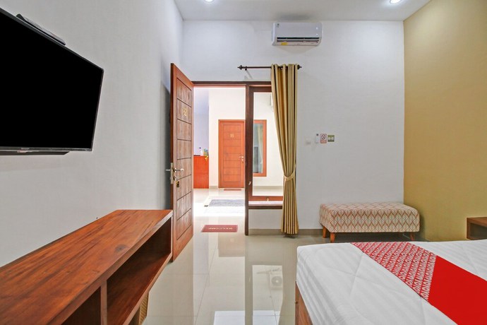 Imagen de la habitación del Hotel OYO 90820 Madania Guesthouse Syariah. Foto 10