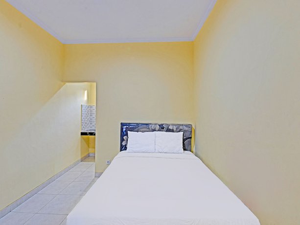 Imagen de la habitación del Hotel OYO 90823 Casa Jupiter Shine. Foto 2