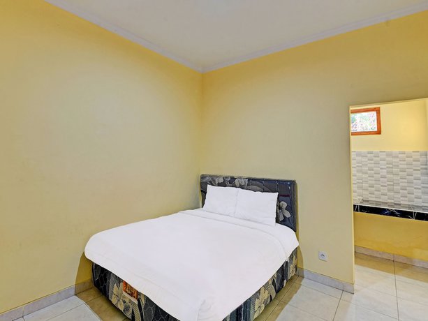 Imagen de la habitación del Hotel OYO 90823 Casa Jupiter Shine. Foto 3