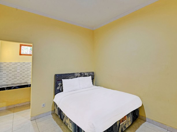Imagen de la habitación del Hotel OYO 90823 Casa Jupiter Shine. Foto 4
