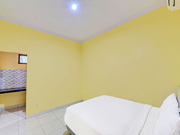 Imagen de la habitación del Hotel OYO 90823 Casa Jupiter Shine. Foto 7