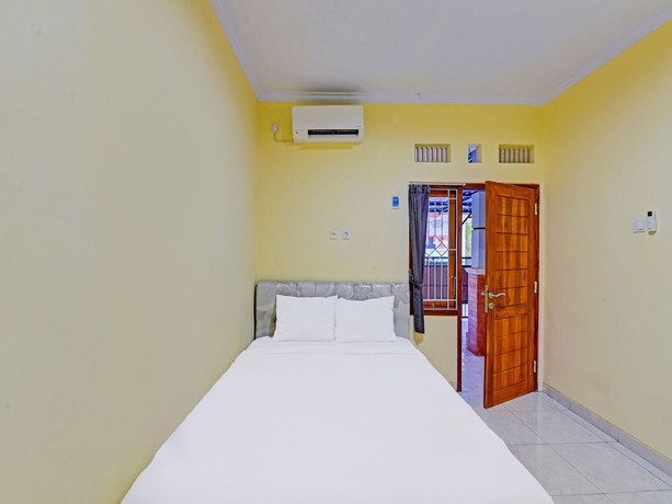 Imagen de la habitación del Hotel OYO 90823 Casa Jupiter Shine. Foto 12
