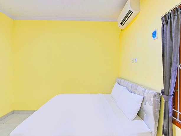 Imagen de la habitación del Hotel OYO 90823 Casa Jupiter Shine. Foto 16