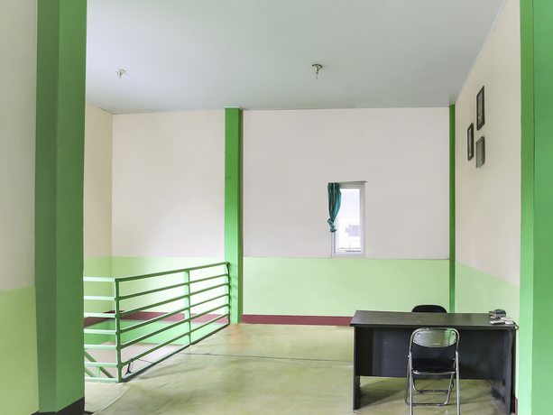 Imagen de los interiores del Hotel OYO 90825 Lizha 2. Foto 17