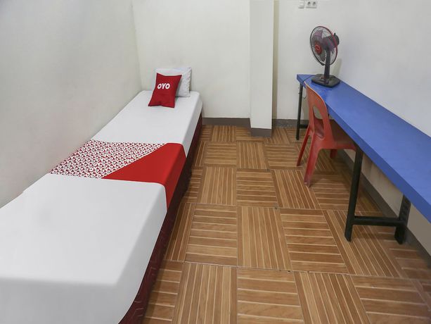Imagen de la habitación del Hotel OYO 90825 Lizha 2. Foto 4