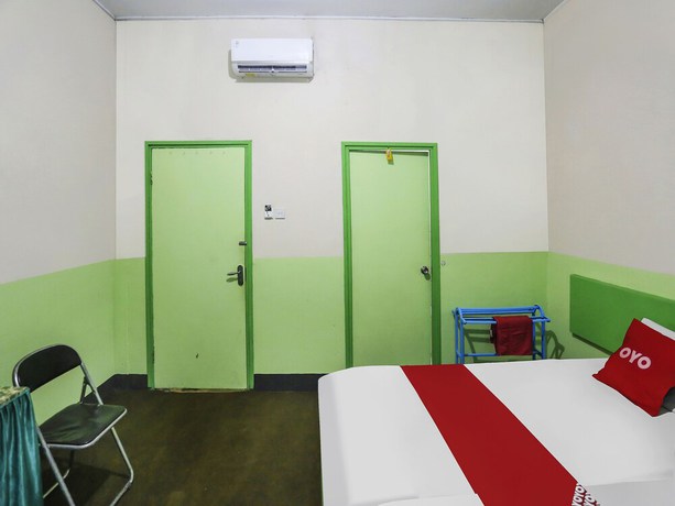 Imagen de la habitación del Hotel OYO 90825 Lizha 2. Foto 5