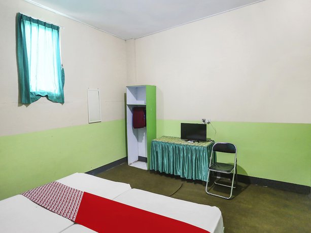 Imagen de la habitación del Hotel OYO 90825 Lizha 2. Foto 6
