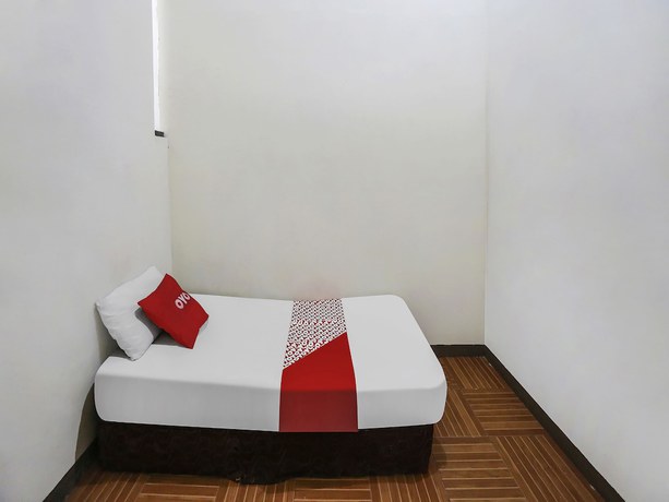 Imagen de la habitación del Hotel OYO 90825 Lizha 2. Foto 8