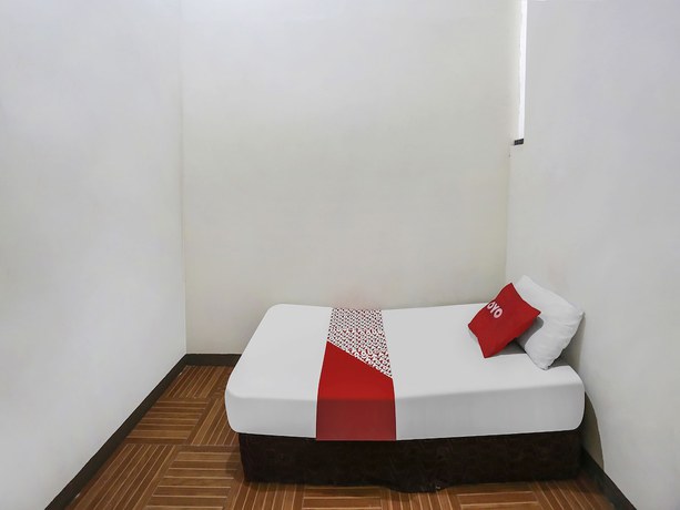 Imagen de la habitación del Hotel OYO 90825 Lizha 2. Foto 10