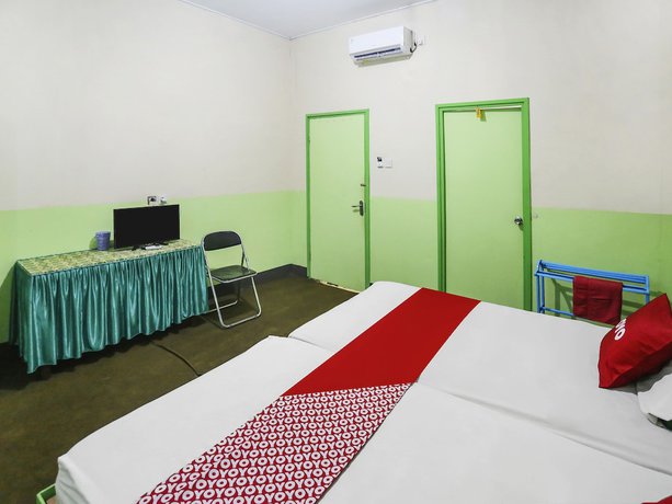 Imagen de la habitación del Hotel OYO 90825 Lizha 2. Foto 12