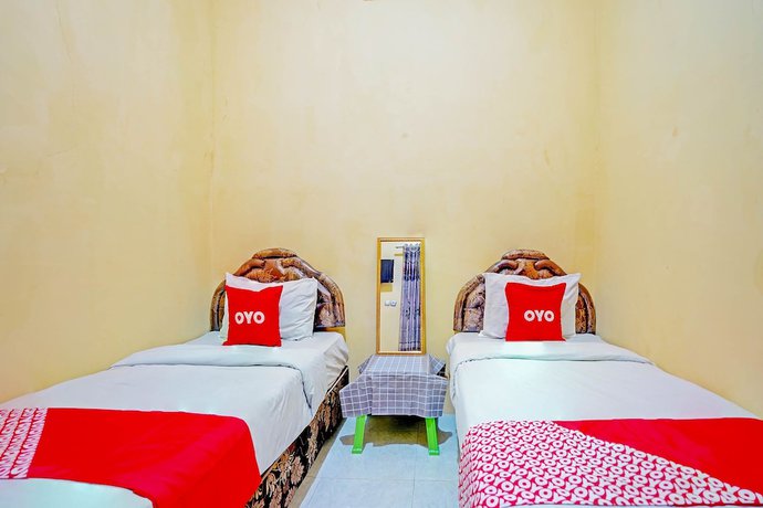 Imagen de la habitación del Hotel OYO 90829 Sahara Homestay Syariah. Foto 2